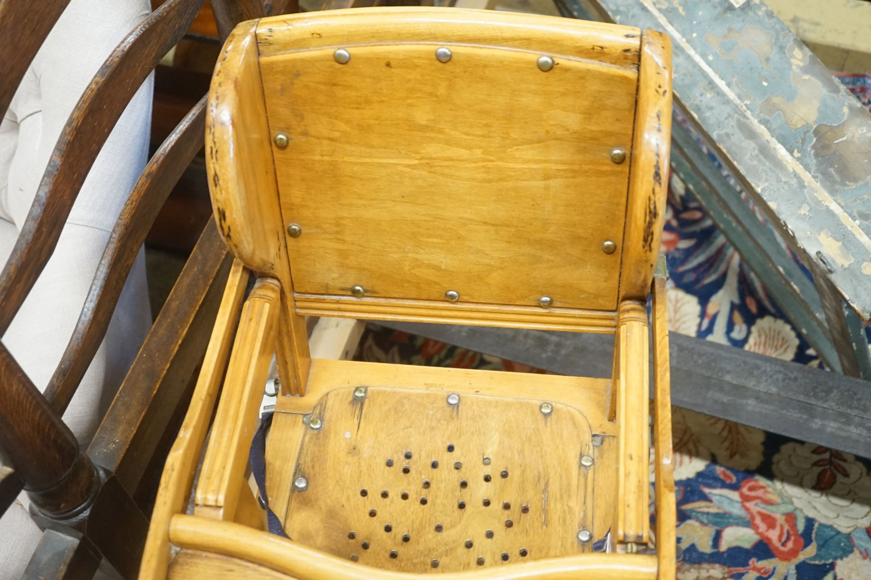 An early 20th century metamorphic child's high chair, together with a Victorian Windsor high chair